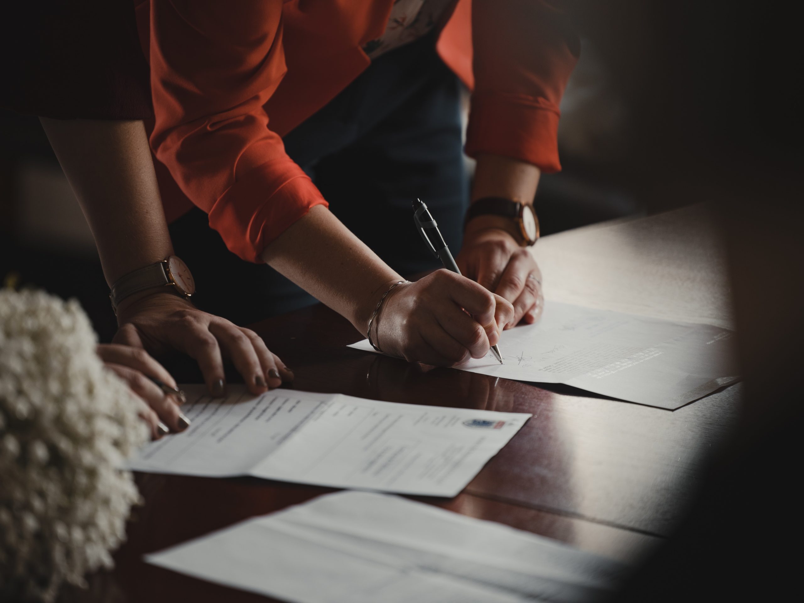 A business owner signing a share agreement