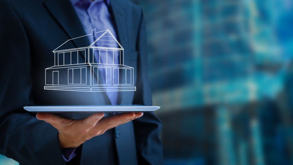 An graphic showing a man holding an image of an estate above his computer.