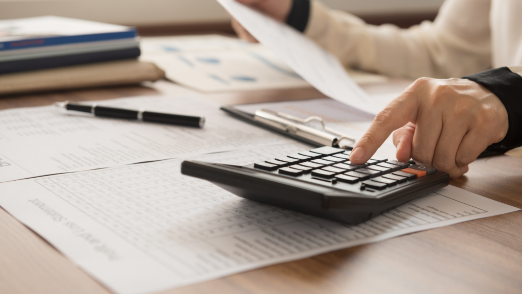 An image of a small business owner in Burlington reviewing their financial ratios for their small business