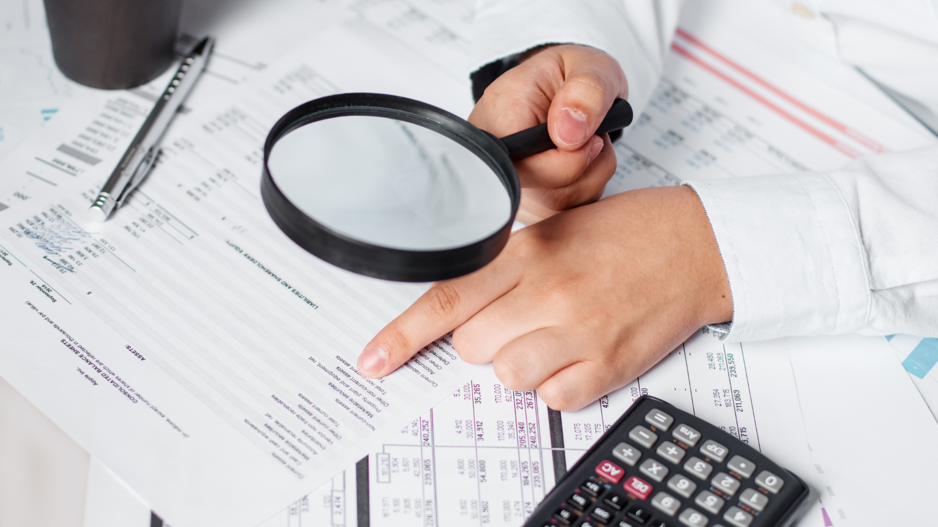 An image of a Burlington Accountant reviewing financial documents for an audit