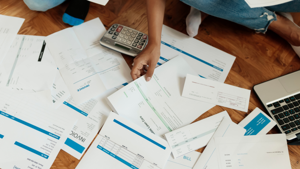 An image of a small business owner in Burlington reviewing their bad debt