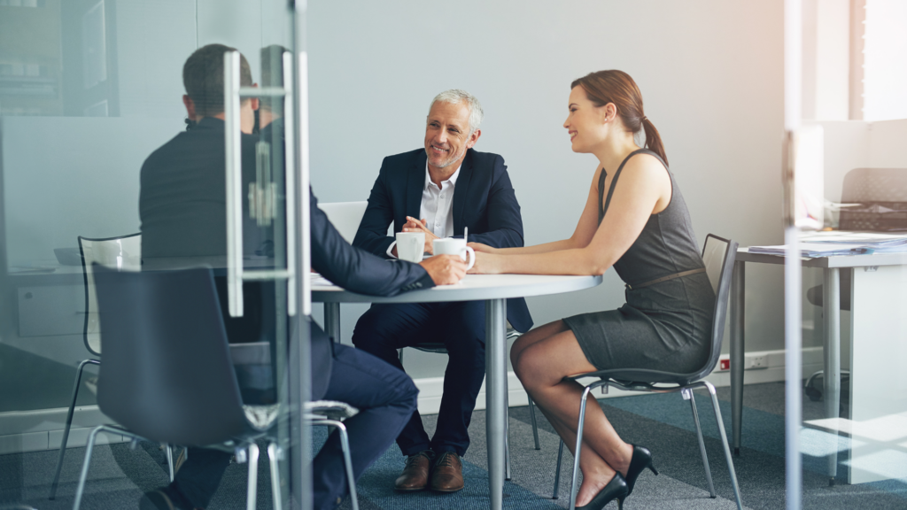 An image of a succession planning meeting where they are discussing Employee Ownership Trusts (EOT)