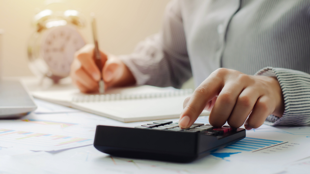 An image of a local Burlington accountant calculating a the alternative minimum tax (AMT) for this client.