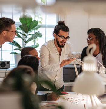 An image of a team meeting at a small Burlington startup
