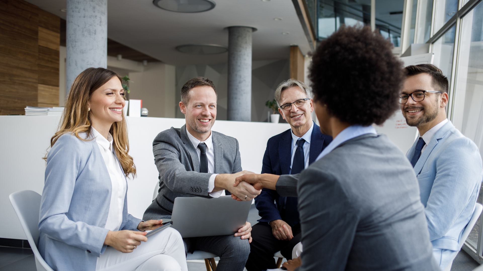 An image of a small business in Hamilton Ontario that is meeting to discuss Corporate Reorganizations & Succession Planning