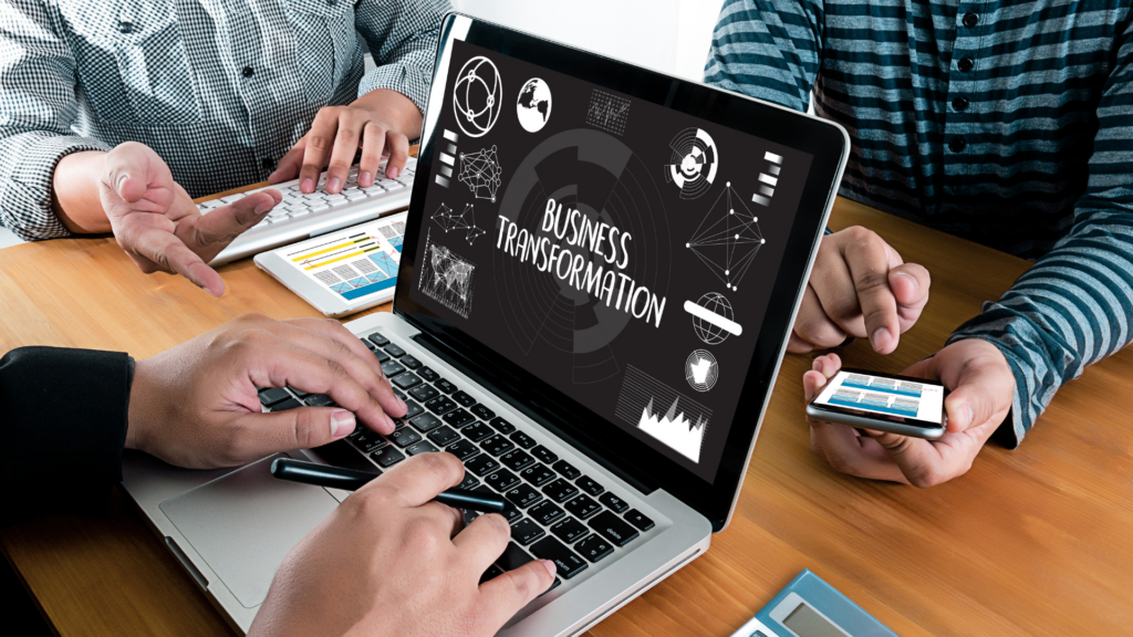 An image of a small business team at their office in Burlington, where they are discussing the Digital Services Tax and how it is impacting them directly.