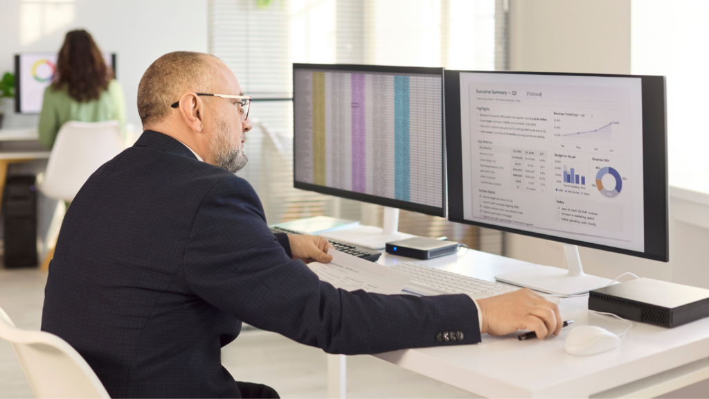 An image of a local Burlington bookkeeper who is reviewing a client's general ledger
