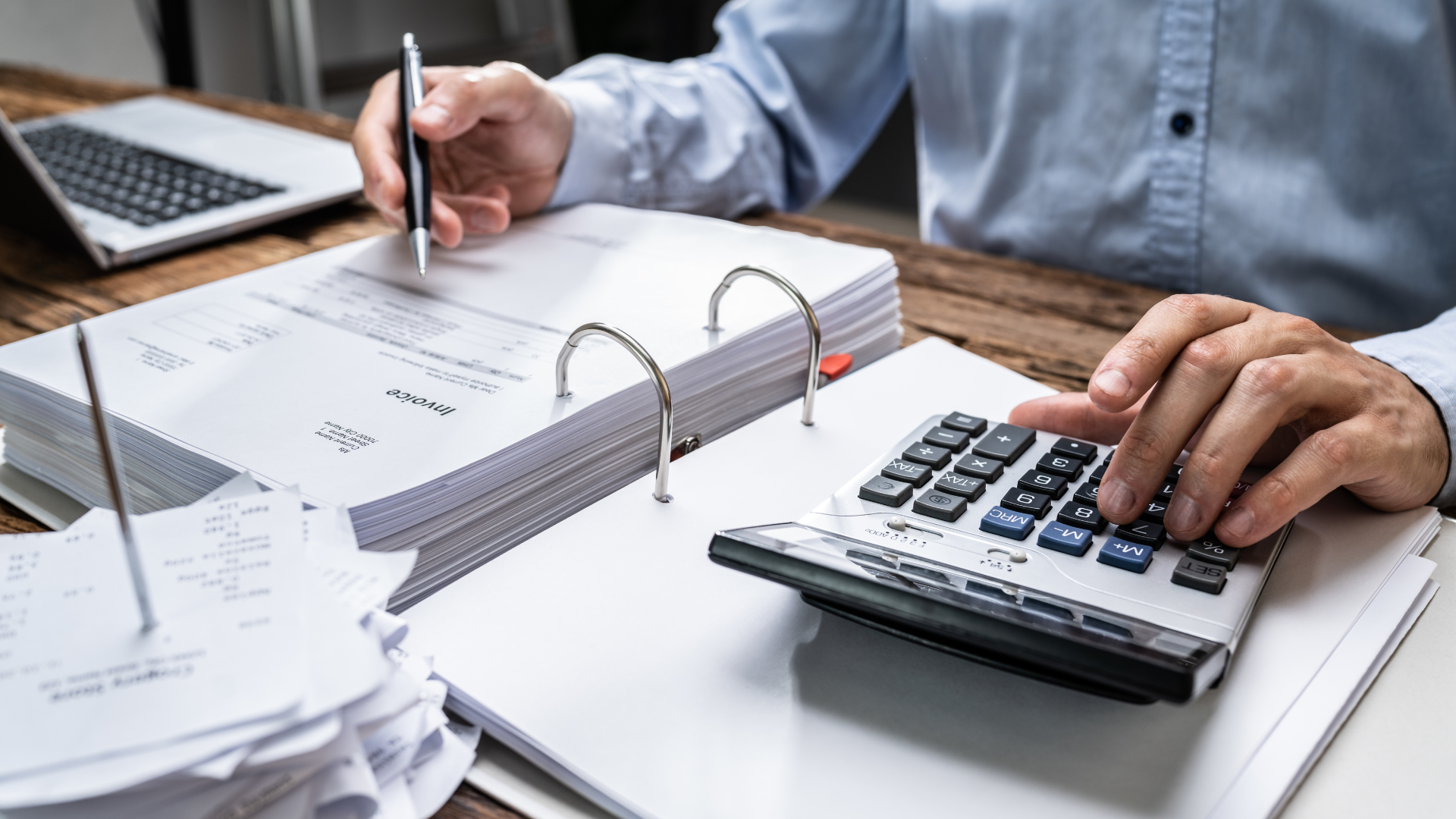 An image of a small business owner in Burlington who is considering hiring an outsourced CPA firm to help with his accounting needs.
