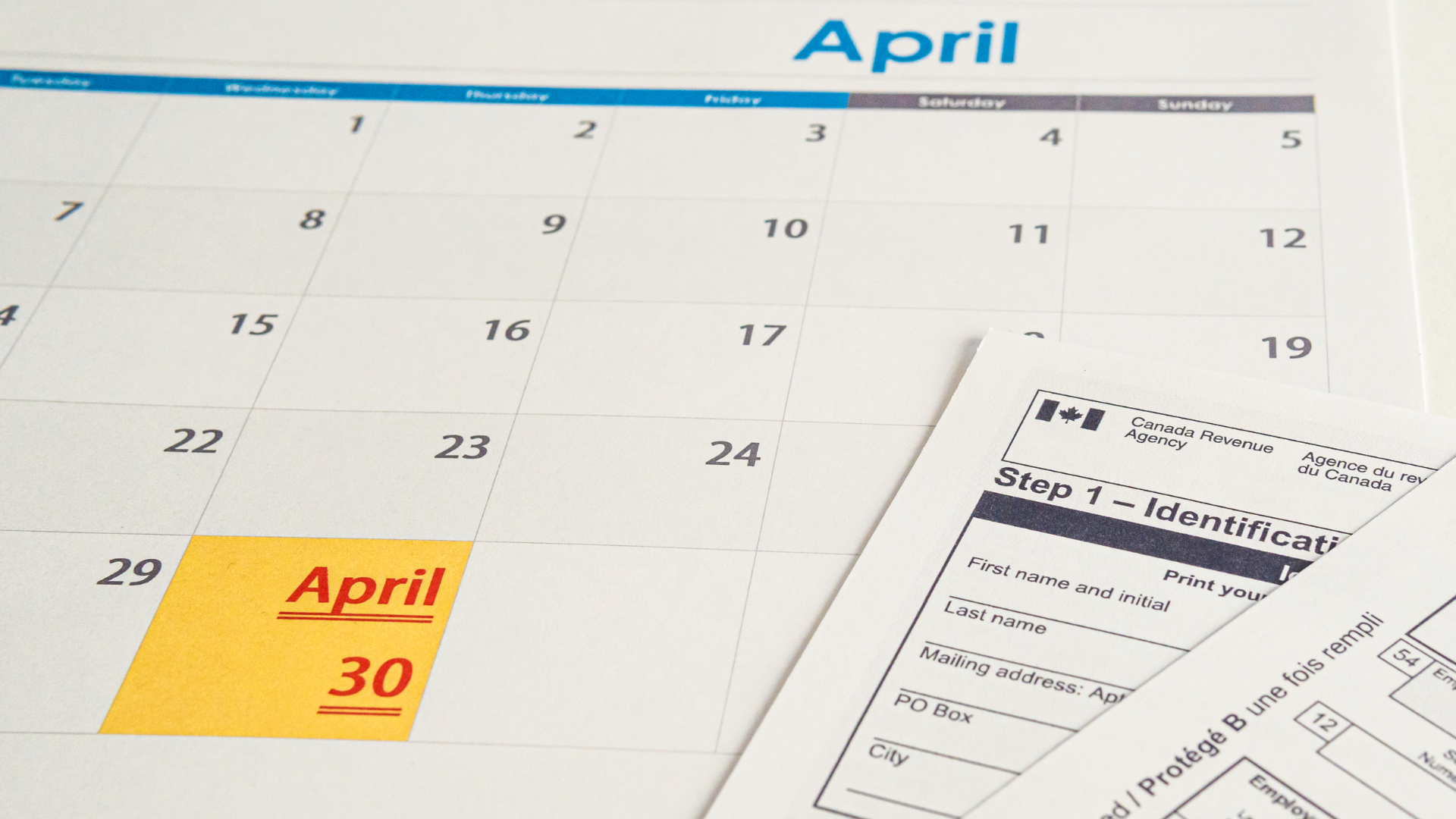 An image of a APRIL calendar with April 30th highlighted to remind the user to file their tax return