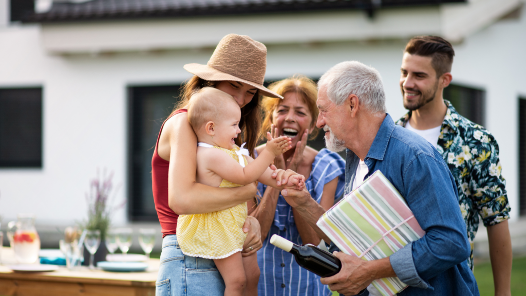 An image of a family throwing the grandfather a retirement party at their house in Burlington